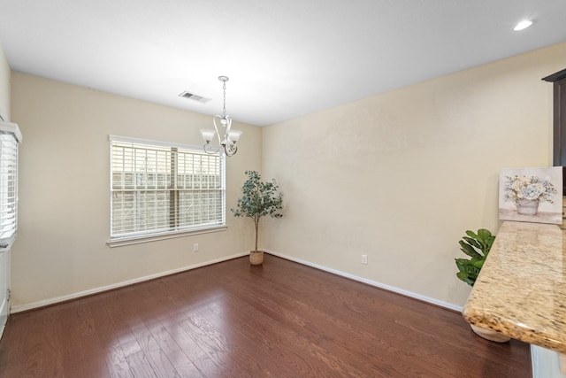 12627 Ashford Shore Dr, Houston, TX 77072 - unfurnished dining area featuring a chandelier, dark wood finished floors, baseboards, and recessed lighting