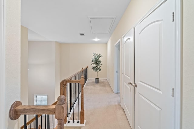 12627 Ashford Shore Dr, Houston, TX 77072 - hall featuring an upstairs landing, attic access, and light colored carpet