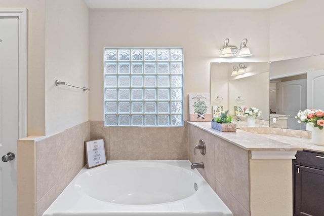 12627 Ashford Shore Dr, Houston, TX 77072 - bathroom with a garden tub and vanity