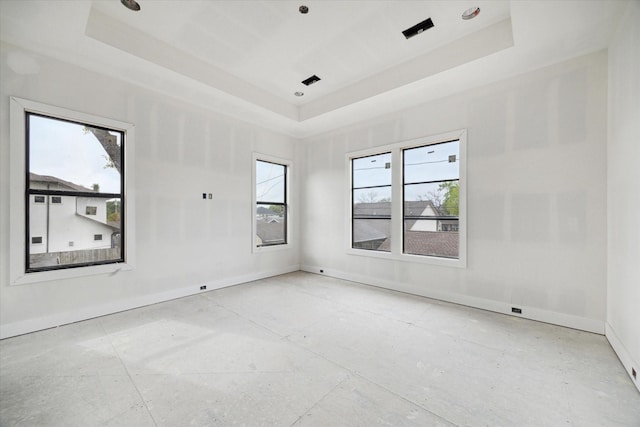 1710 Ebony Ln, Houston, TX 77018 - spare room featuring a raised ceiling and baseboards
