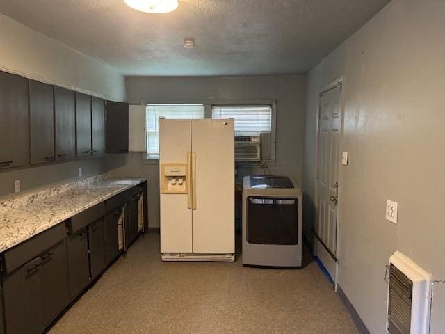5111 Kelso St, Houston, TX 77021 - kitchen featuring white refrigerator with ice dispenser, washer / clothes dryer, heating unit, and cooling unit