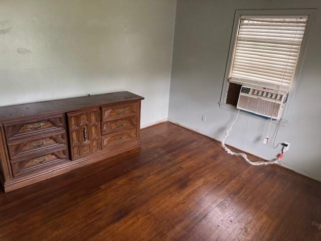 5111 Kelso St, Houston, TX 77021 - unfurnished room with dark wood-style floors and cooling unit