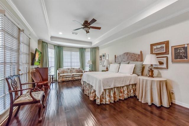 6 Woodsborough Cir, Houston, TX 77055 - bedroom with hardwood / wood-style floors, a tray ceiling, recessed lighting, crown molding, and baseboards