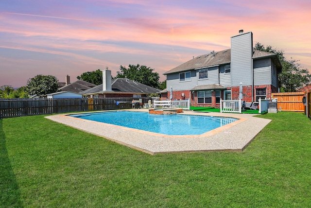 4026 Almond Lake Dr, Houston, TX 77047 - pool at dusk featuring a pool with connected hot tub