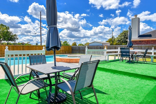 4026 Almond Lake Dr, Houston, TX 77047 - view of patio / terrace featuring outdoor dining area and a hot tub