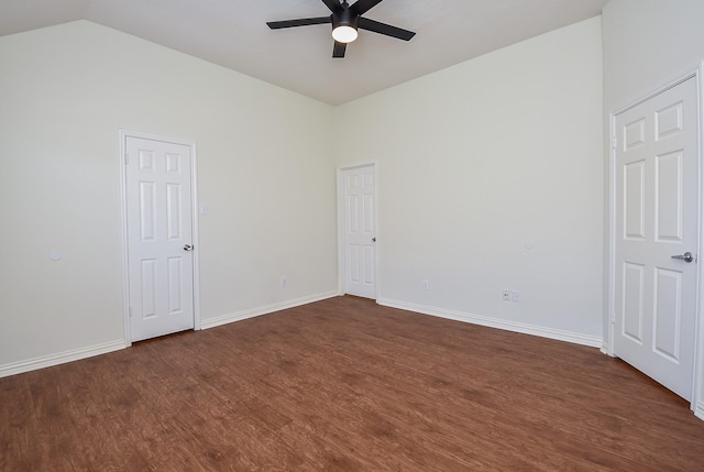 4026 Almond Lake Dr, Houston, TX 77047 - unfurnished bedroom featuring dark wood finished floors, lofted ceiling, baseboards, and a ceiling fan