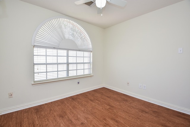 4026 Almond Lake Dr, Houston, TX 77047 - unfurnished room with wood finished floors, baseboards, and a ceiling fan