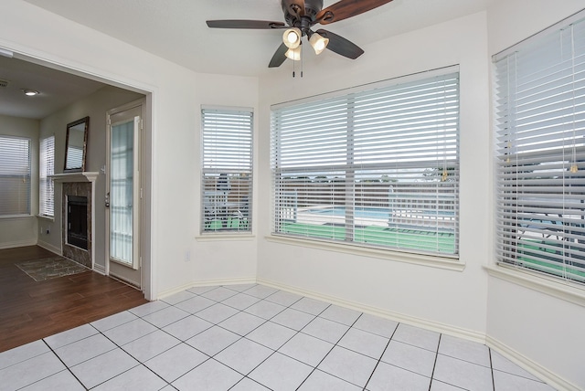 4026 Almond Lake Dr, Houston, TX 77047 - unfurnished room featuring ceiling fan, healthy amount of natural light, and baseboards