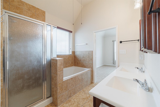 20210 Stonebridge Terrace Dr, Richmond, TX 77407 - bathroom with double vanity, a garden tub, a shower stall, and tile patterned flooring
