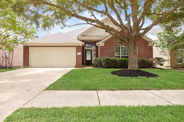 18519 Water Scene Trl, Cypress, TX 77429 - view of front of property with an attached garage, concrete driveway, brick siding, and a front yard