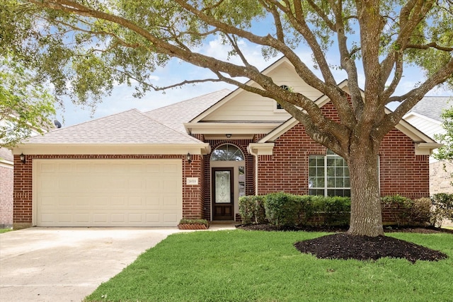 18519 Water Scene Trl, Cypress, TX 77429 - view of front of property with an attached garage, brick siding, driveway, and a front yard
