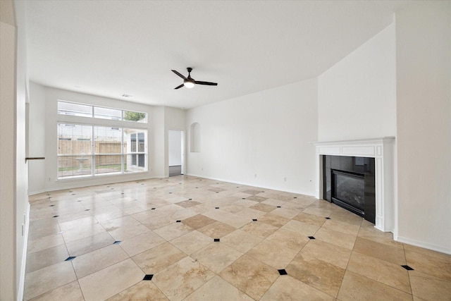 18519 Water Scene Trl, Cypress, TX 77429 - unfurnished living room with a fireplace, ceiling fan, light tile patterned floors, and baseboards