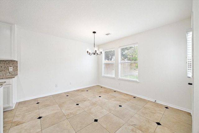 18519 Water Scene Trl, Cypress, TX 77429 - unfurnished dining area with a chandelier, baseboards, and light tile patterned flooring