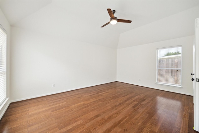 18519 Water Scene Trl, Cypress, TX 77429 - empty room with vaulted ceiling, wood finished floors, a ceiling fan, and baseboards