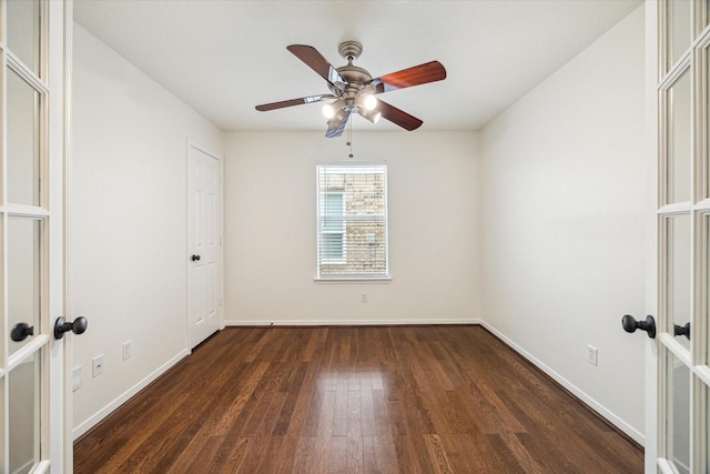 18519 Water Scene Trl, Cypress, TX 77429 - spare room with dark wood-style flooring, baseboards, and ceiling fan
