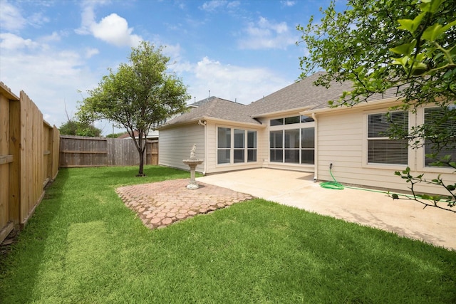 18519 Water Scene Trl, Cypress, TX 77429 - rear view of property featuring a patio and a shingled roof
