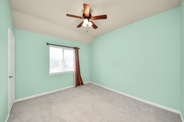 2304 Shadow Canyon Ct, Pearland, TX 77584 - empty room with ceiling fan, light carpet, baseboards, and vaulted ceiling