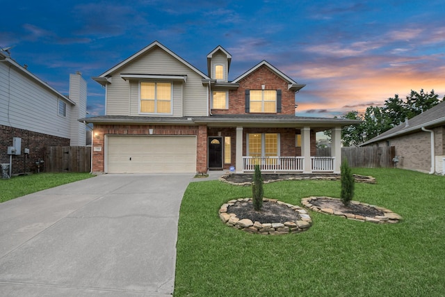 2304 Shadow Canyon Ct, Pearland, TX 77584 - view of front of property featuring covered porch, a garage, brick siding, and driveway