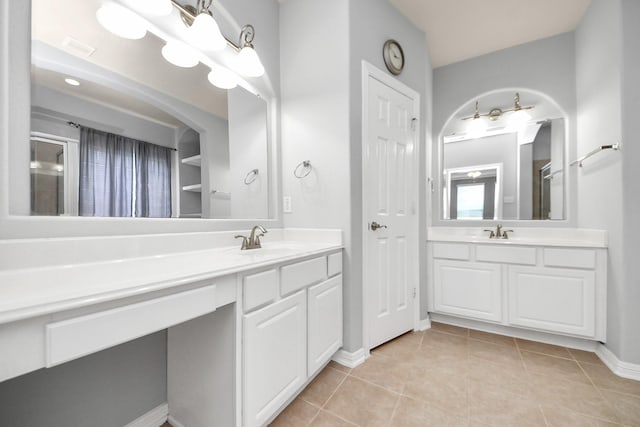2304 Shadow Canyon Ct, Pearland, TX 77584 - full bath with baseboards, vanity, tile patterned floors, and a shower with shower door