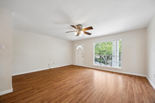 14333 Memorial Dr Unit 72, Houston, TX 77079 - spare room with ceiling fan, wood finished floors, and baseboards
