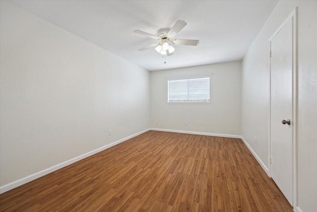 14333 Memorial Dr Unit 72, Houston, TX 77079 - unfurnished room with wood finished floors, baseboards, and ceiling fan