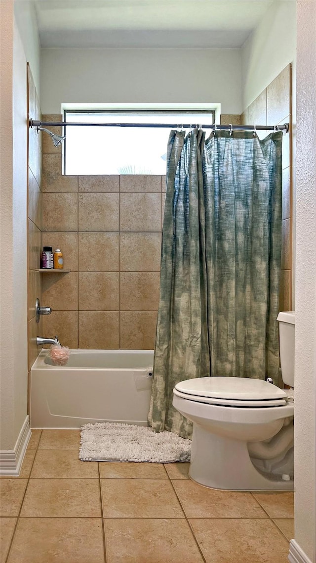19406 Egret Haven Ln, Cypress, TX 77433 - full bathroom with shower / bath combo with shower curtain, toilet, and tile patterned flooring