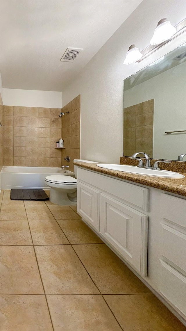 19406 Egret Haven Ln, Cypress, TX 77433 - bathroom with vanity, tile patterned floors, shower / washtub combination, and toilet