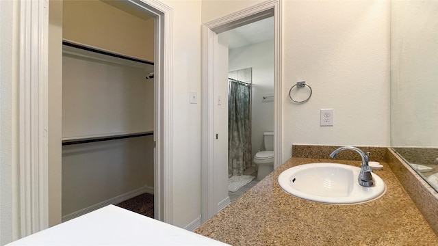 19406 Egret Haven Ln, Cypress, TX 77433 - full bathroom featuring toilet, vanity, and a shower with curtain