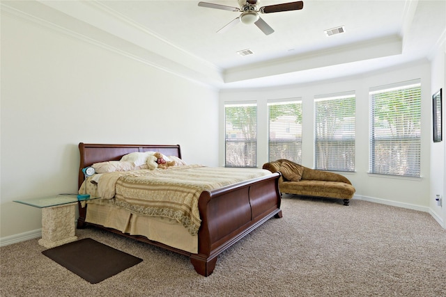 19406 Egret Haven Ln, Cypress, TX 77433 - bedroom featuring a tray ceiling, carpet flooring, ornamental molding, and baseboards