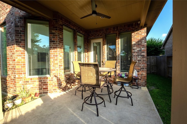 19406 Egret Haven Ln, Cypress, TX 77433 - view of patio with ceiling fan and outdoor dining area