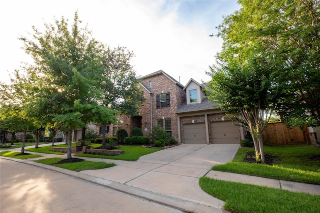 19406 Egret Haven Ln, Cypress, TX 77433 - view of front of house with brick siding, driveway, and a garage