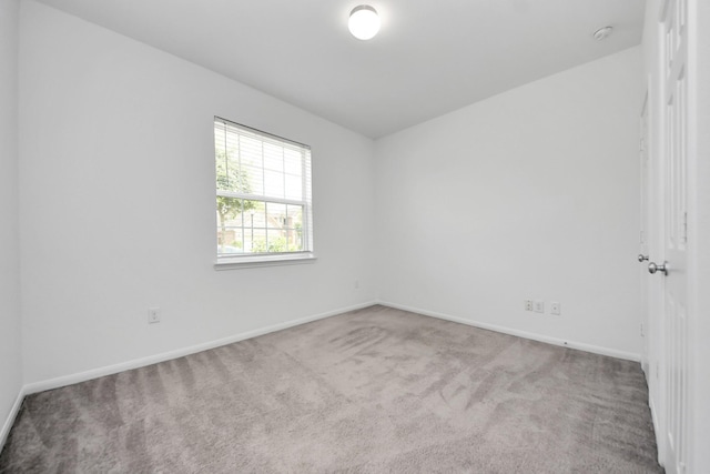 3727 Varna Ct, Missouri City, TX 77459 - carpeted empty room featuring baseboards and a smoke detector