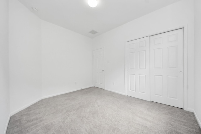3727 Varna Ct, Missouri City, TX 77459 - unfurnished bedroom featuring carpet, baseboards, and a closet