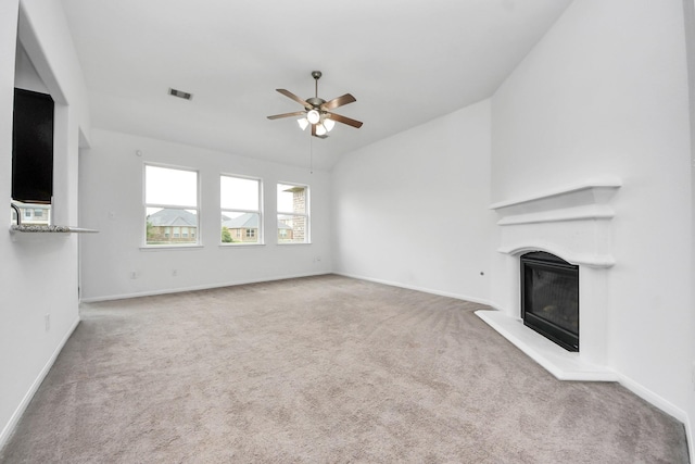 3727 Varna Ct, Missouri City, TX 77459 - unfurnished living room featuring a ceiling fan, carpet flooring, a glass covered fireplace, vaulted ceiling, and baseboards