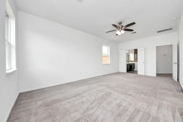 3727 Varna Ct, Missouri City, TX 77459 - unfurnished living room with carpet, a ceiling fan, and baseboards