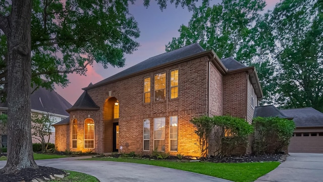 1806 Wine Cedar Ln, Katy, TX 77450 - view of front of house featuring brick siding, concrete driveway, and a front lawn