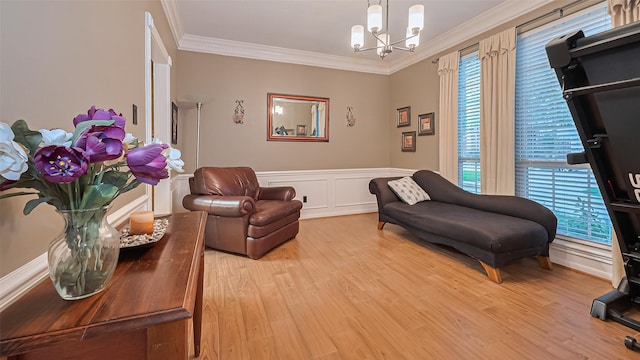 1806 Wine Cedar Ln, Katy, TX 77450 - sitting room featuring a chandelier, wood finished floors, crown molding, healthy amount of natural light, and wainscoting