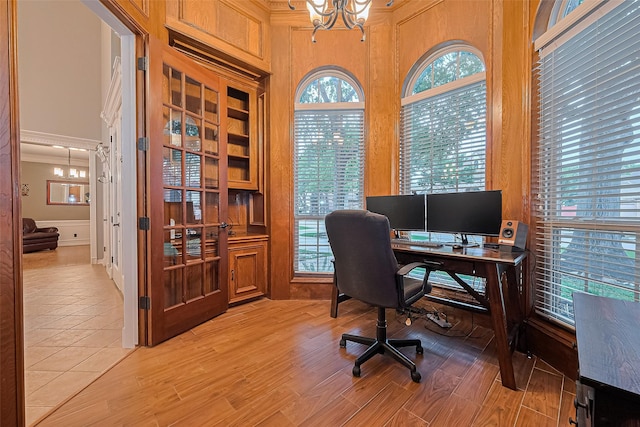 1806 Wine Cedar Ln, Katy, TX 77450 - office space with a chandelier, light wood-style flooring, healthy amount of natural light, crown molding, and a high ceiling
