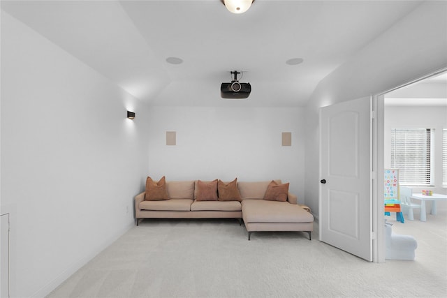 4706 Oak Glen Ct, Manvel, TX 77578 - cinema with light carpet, lofted ceiling, and baseboards