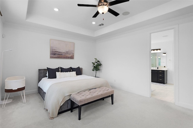 4706 Oak Glen Ct, Manvel, TX 77578 - bedroom featuring recessed lighting, a tray ceiling, baseboards, light carpet, and ensuite bath