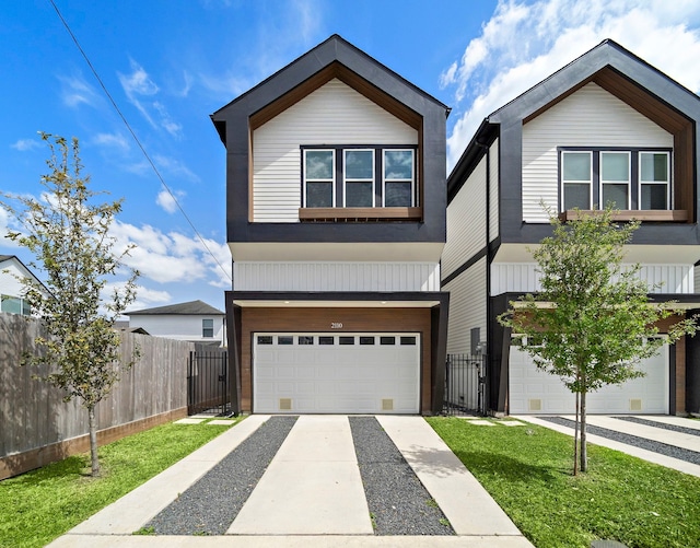 2110 Beall St, Houston, TX 77008 - view of front facade with an attached garage and driveway