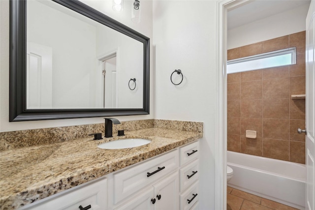 5402 Jonathan Ln, Houston, TX 77011 - full bathroom featuring vanity, toilet, shower / bath combination, and tile patterned floors