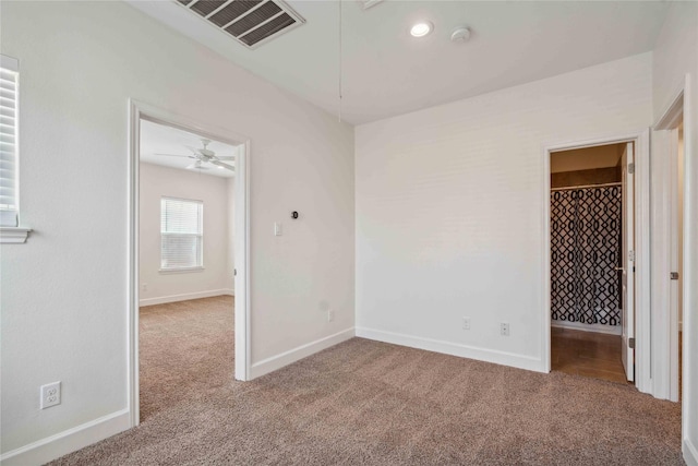 5402 Jonathan Ln, Houston, TX 77011 - unfurnished bedroom featuring carpet, baseboards, and recessed lighting