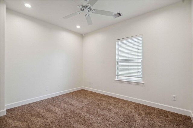 5402 Jonathan Ln, Houston, TX 77011 - unfurnished room with carpet, baseboards, a ceiling fan, and recessed lighting