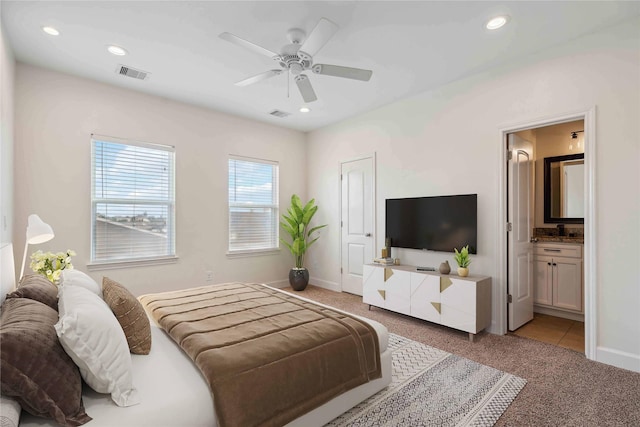 5402 Jonathan Ln, Houston, TX 77011 - bedroom featuring light carpet, recessed lighting, ensuite bath, a ceiling fan, and baseboards