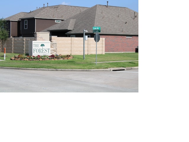 16702 Morning Shadows Way, Humble, TX 77346 - view of concrete street featuring curbs and traffic signs