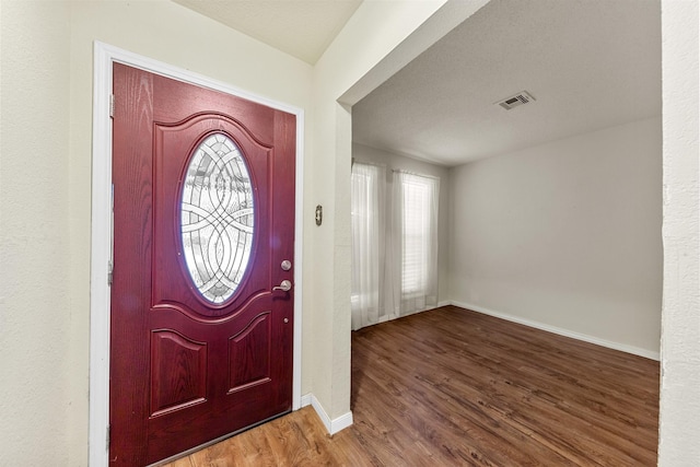 7306 Nightingale Cir, Texas City, TX 77591 - entryway with wood finished floors and baseboards