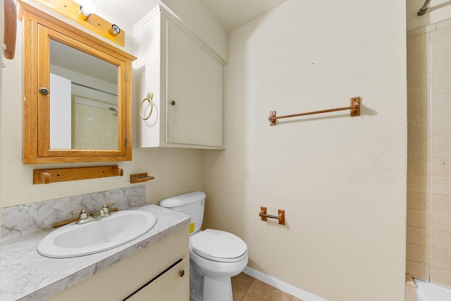 7306 Nightingale Cir, Texas City, TX 77591 - full bathroom with vanity, toilet, a shower, tile patterned flooring, and baseboards