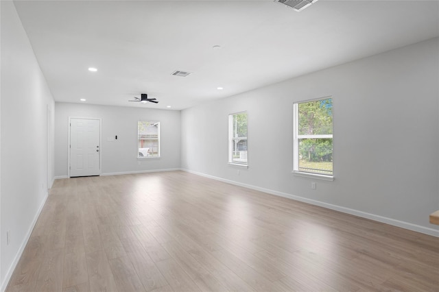 2811 Winbern St, Houston, TX 77004 - unfurnished room with healthy amount of natural light, ceiling fan, light wood finished floors, recessed lighting, and baseboards