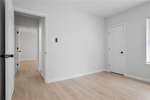 2811 Winbern St, Houston, TX 77004 - spare room featuring light wood-style floors and baseboards